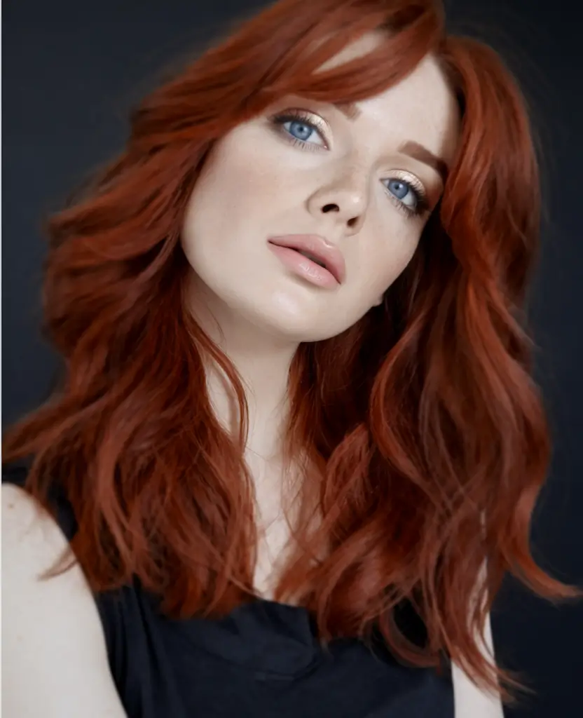Haircuts to Try in October 2025 Deep Auburn with Soft Bangs