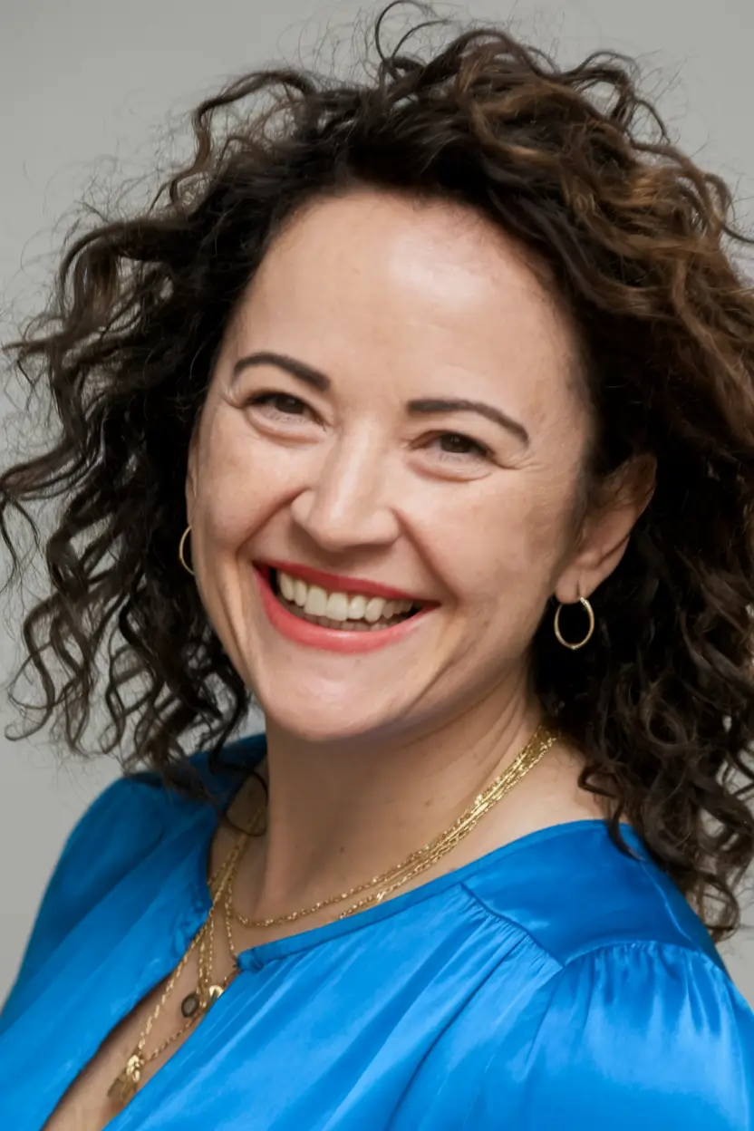 Winter Hairstyles & Color 2025-2026 for Women Over 40 Playful Curls with Natural Charm