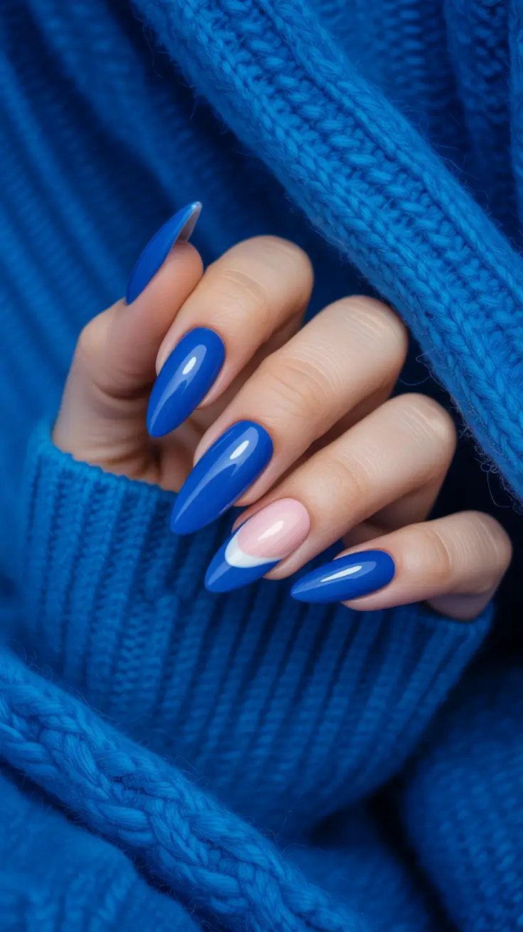 elegant gel nails 2026 Royal Blue Stiletto With Minimal Crescent Art