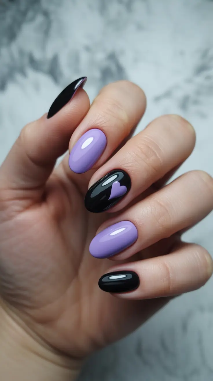 elegant short almond nails 2026 Lavender and Black With a Minimal Heart Accent