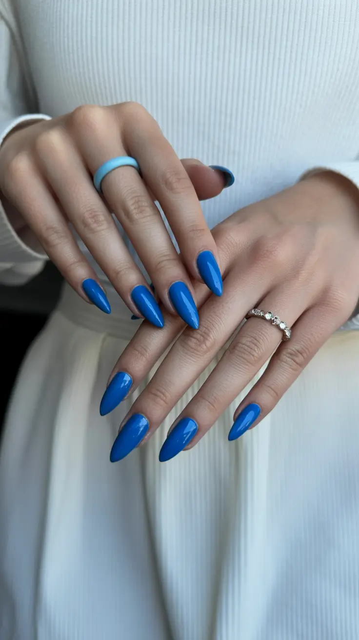 elegant short almond nails 2026 Classic Sky-Blue with Elongated Almond Silhouette