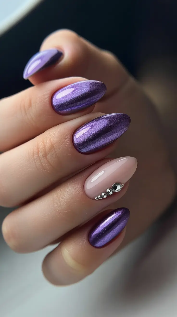 elegant short almond nails 2026 Metallic Purple Glow With Crystal Accent Detailing