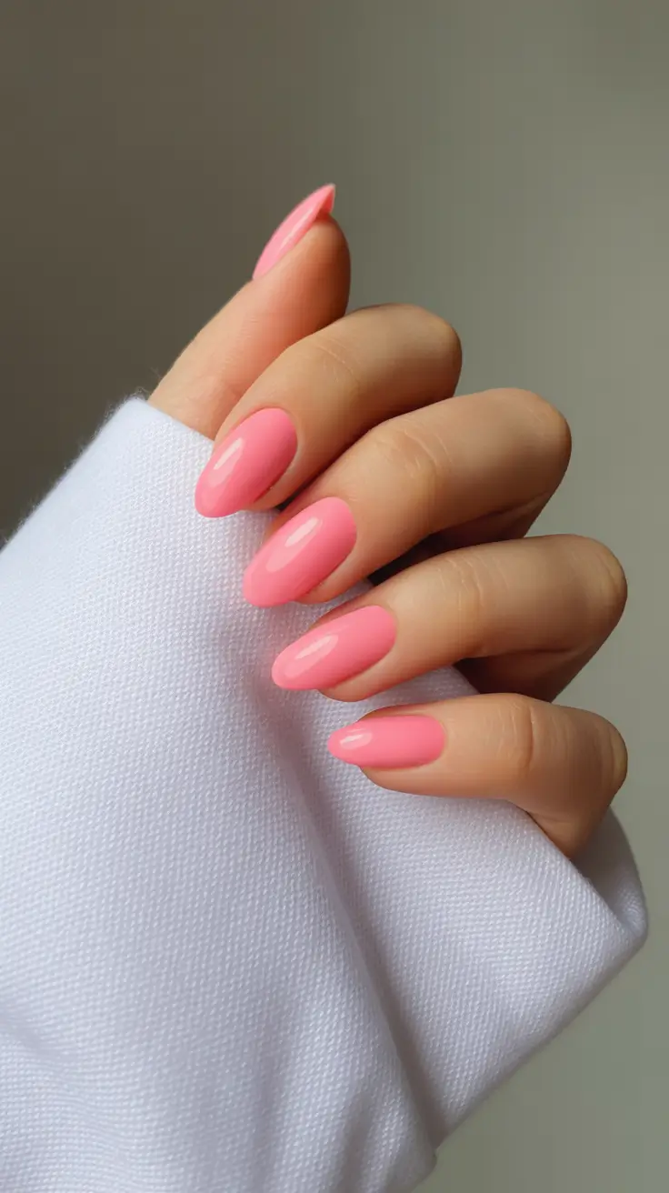 stylish almond nails 2026 Soft Coral Almond Simplicity