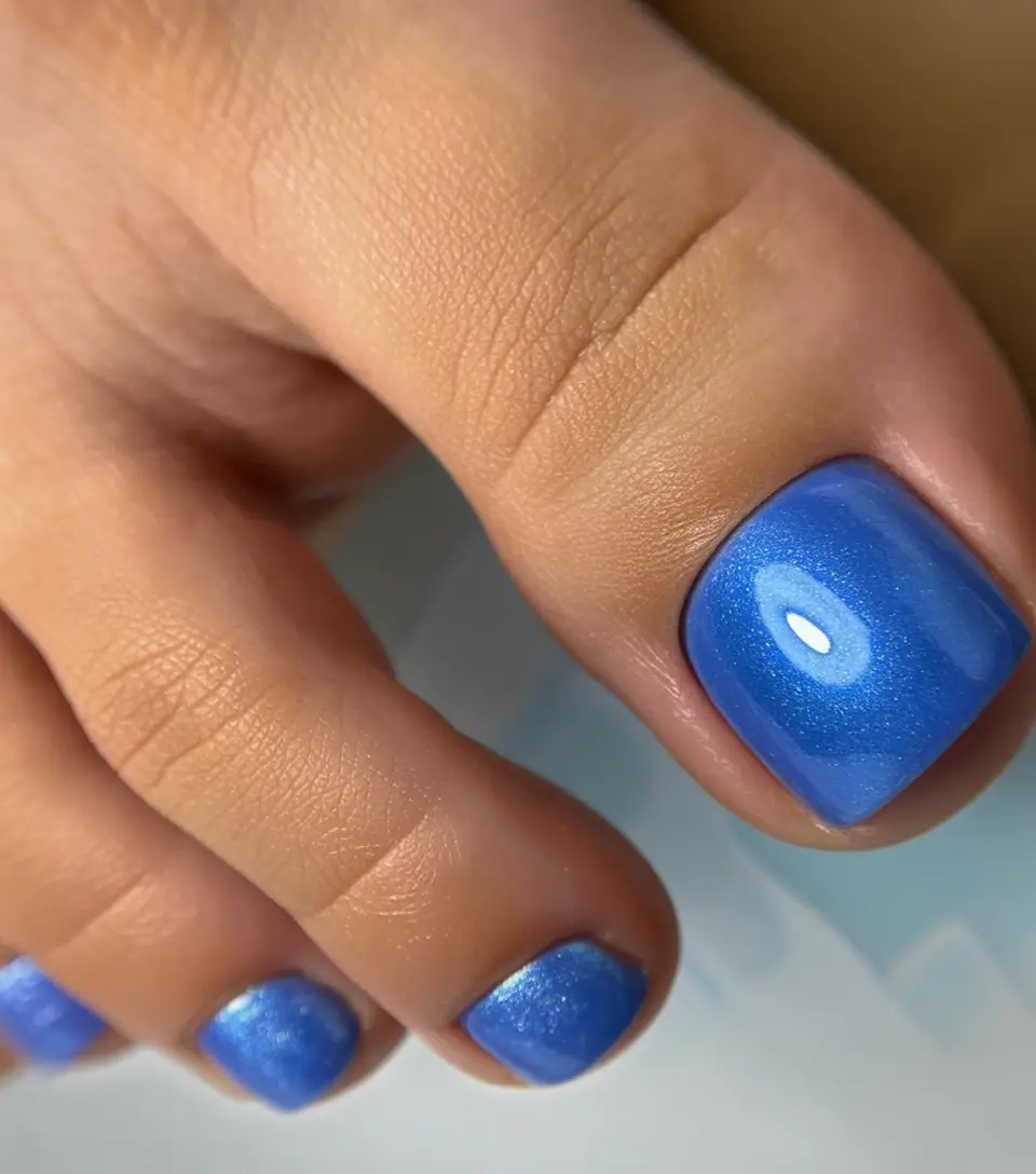 toe nails ideas 2026 Shimmering Ocean Blue