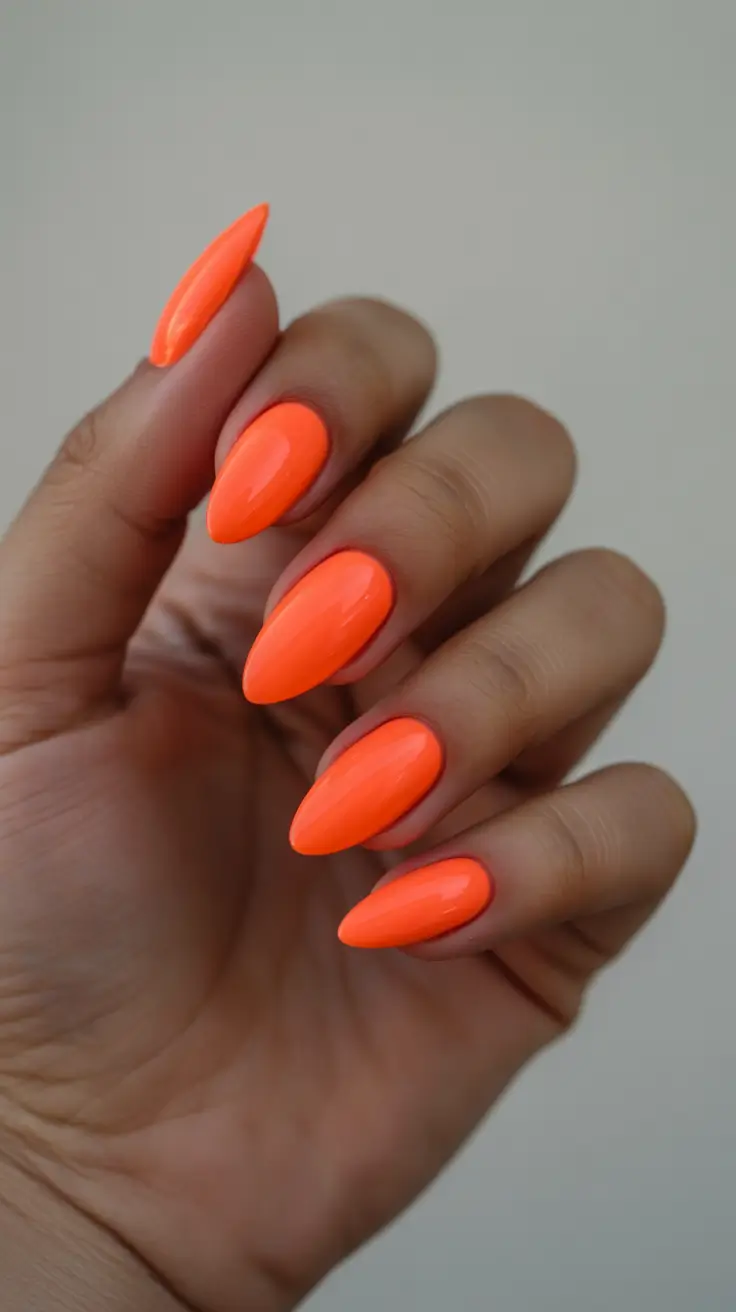 trendy neon nails 2026 Tangerine Pop Almonds