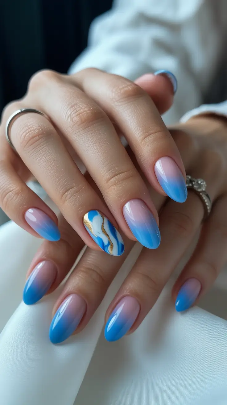 vacation nails trend 2026 Ocean Dip Almond Nails with Marble Accent