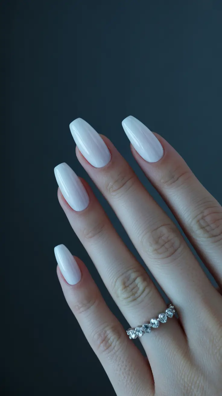 white nails inspiration 2026 Classic Almond Whites With a Polished Sheen