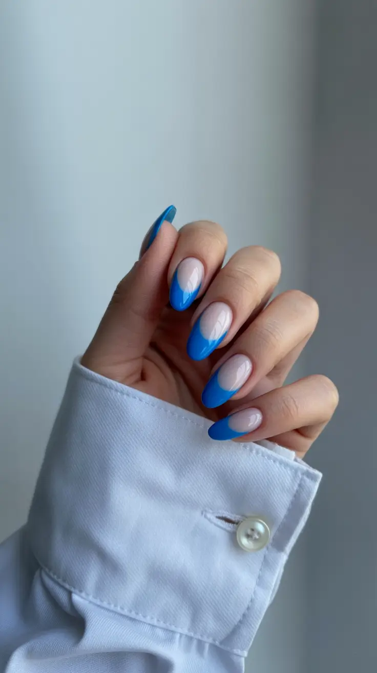 spring-nail-colors-2026-vibrant-neon-french-tips-with-abstract-swirls