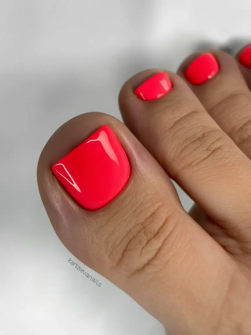 cozy spring toe nail color 2026 Hot Neon Coral for Vibrant Spring Pedicures