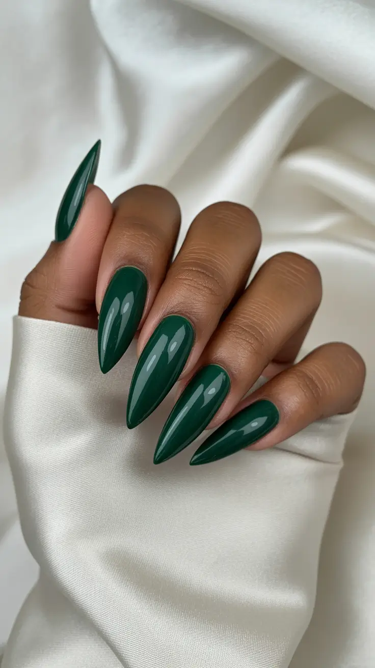 edgy spring almond nails 2026 Deep Emerald Almond Nails for a Bold Spring Statement