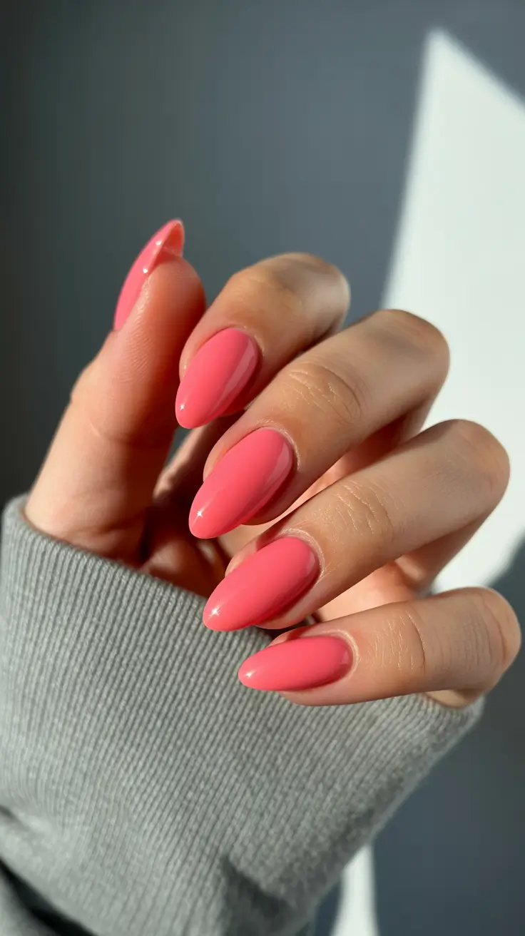 edgy spring almond nails 2026 Glossy Coral Almond Nails for Fresh Seasonal Color