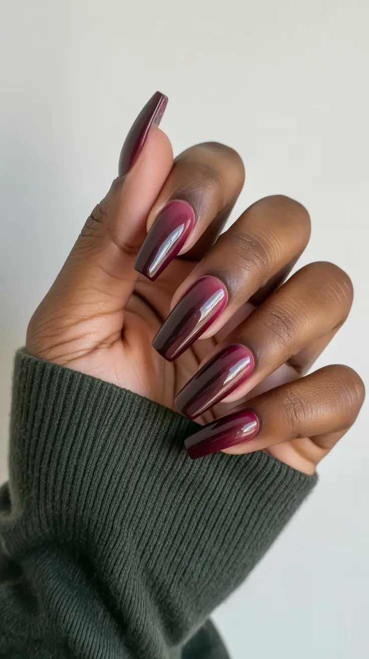 premium spring nails for dark skin 2026 Glossy Deep Berry Drama with Sculpted Shine