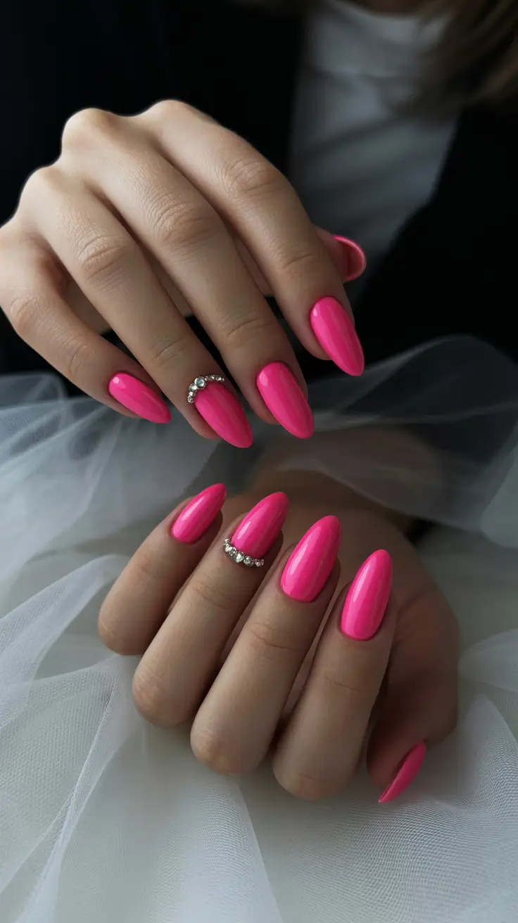 pretty pink spring nails 2026 Bold Hot Pink Almond Nails for Statement Spring Style
