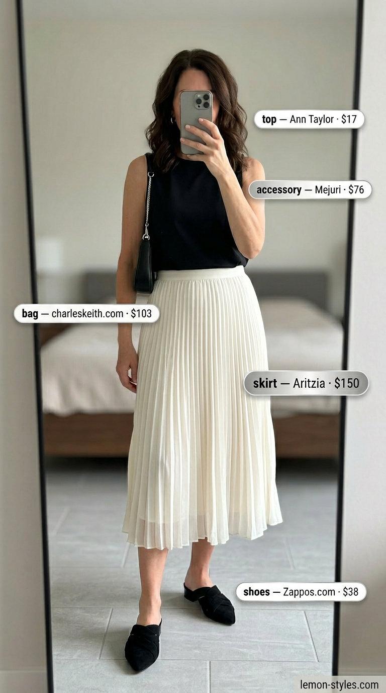 Classic summer outfit for women over 50 2026: Ivory midi skirt, black knit top for gallery or concert.