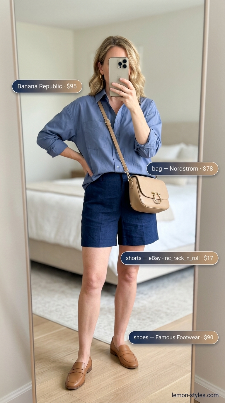 Elevated summer basic outfit for women 2026: Navy linen shorts, white button-down, tan loafers, and crossbody bag.
