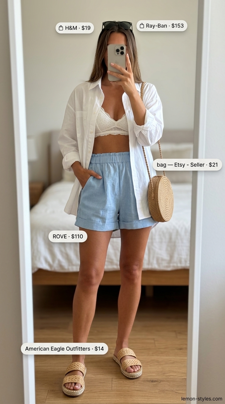 Minimal layer hot summer outfits for women 2026: Sky blue linen shorts, white oversized shirt, and espadrilles for a breezy look.