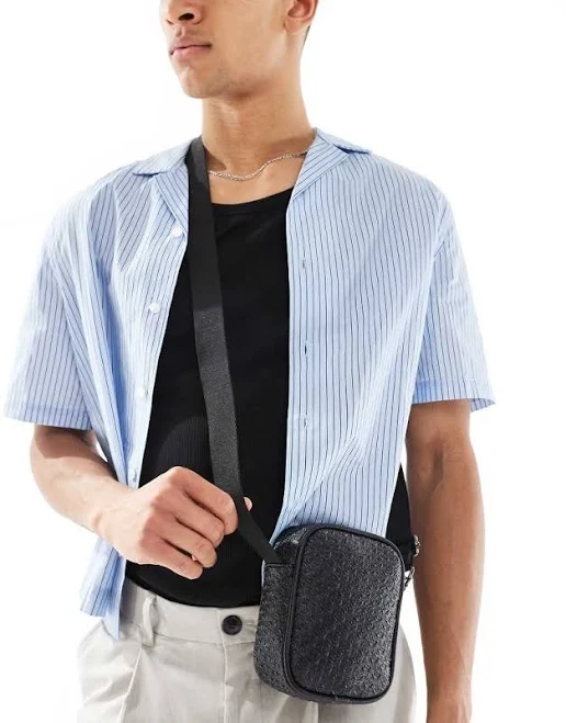 bag ASOS Design Faux Leather Cross Body Camera Bag ASOS $23.09