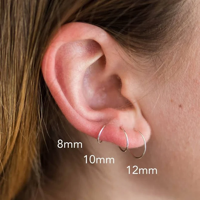 accessory Sterling Silver 24 Gauge Thin Hoop Earrings Sunlight Silver $12.8