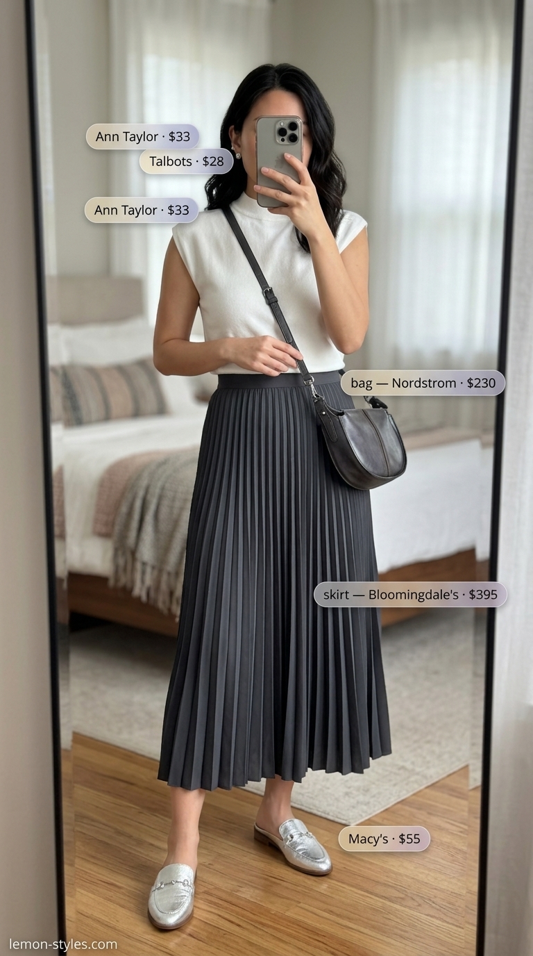Grey pleated midi skirt with white knit top and silver mules for refined classy summer outfits for women 2026.