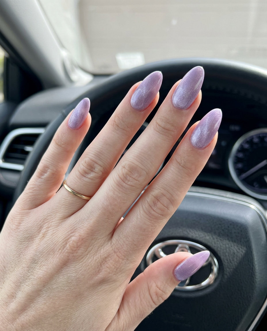 Almond summer nails 2026 for fair skin: Velvet Lavender cat-eye finish. Sophisticated for date nights and formal events.