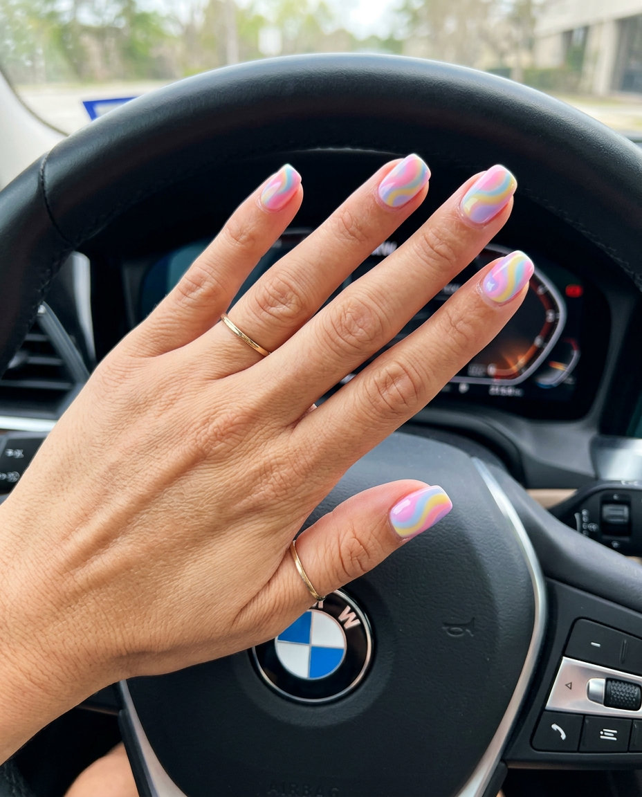Cute summer nails 2026: Candy swirl delight squovals for casual outings and summer fun. Whimsical.