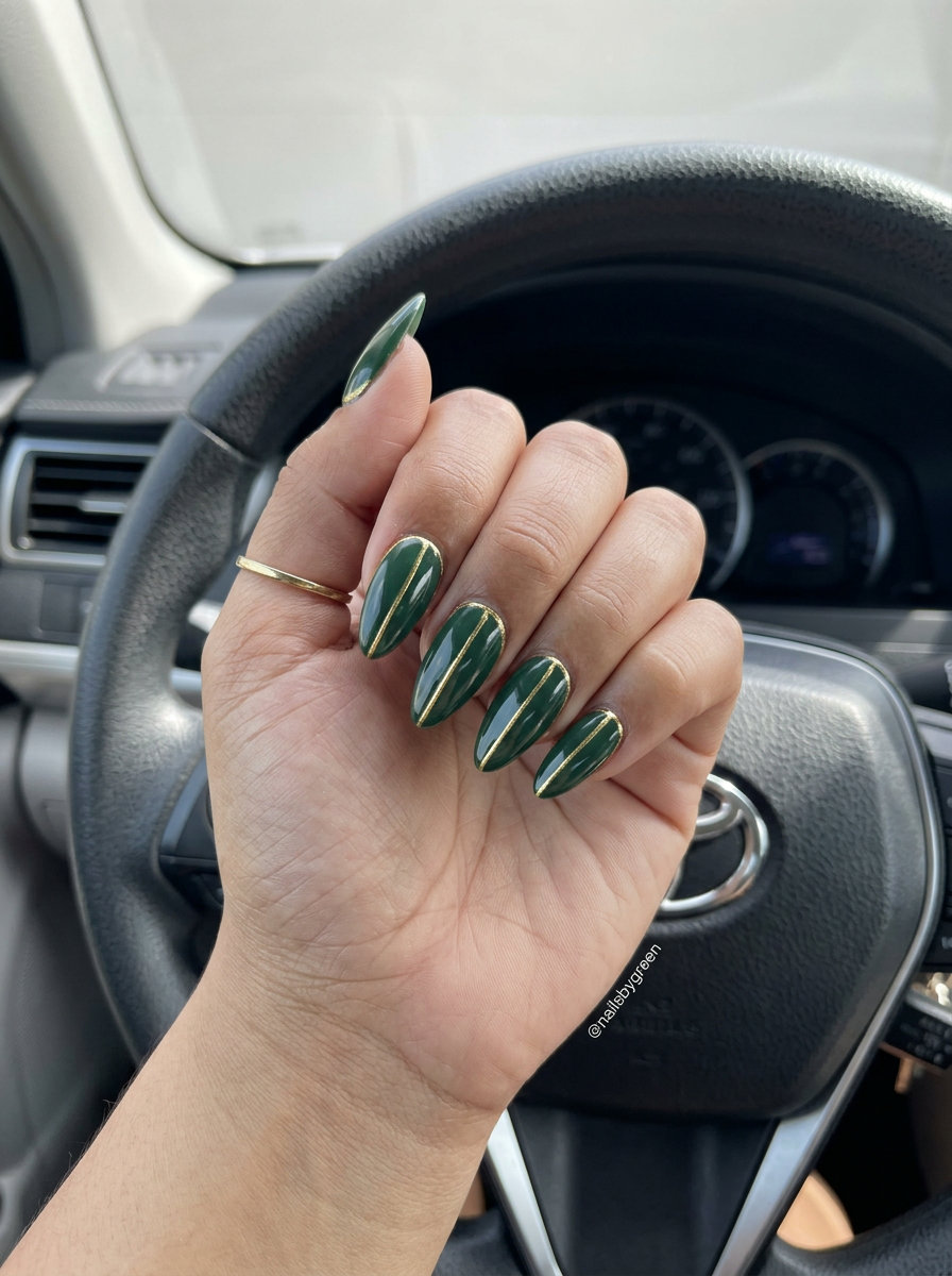 Forest green and gold line art nails for formal events. Elegant green summer nails 2026 with sophistication.