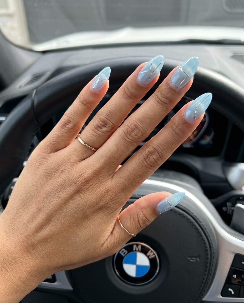 Minimalist icy blue and silver chrome nails for work and daily wear. June nails ideas - best for summer 2026.