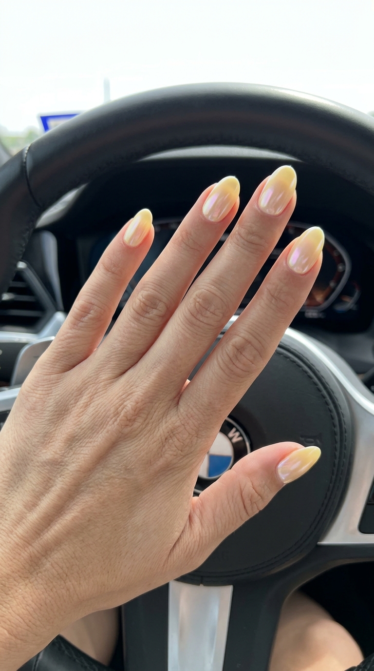 Butter Yellow Glazed Oval Nails 2026 Butter yellow glazed donut oval summer nails 2026, chic for vacation and casual outings. Luminous.