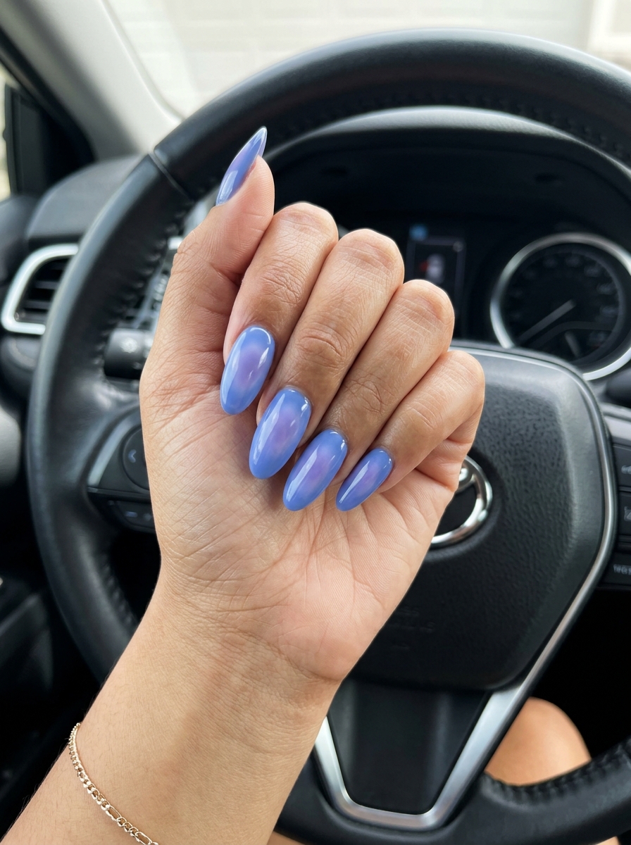 Periwinkle Aura Wash Oval Nails 2026 Oval summer nails 2026 in periwinkle aura wash, perfect for festivals and parties. Ethereal gel polish.