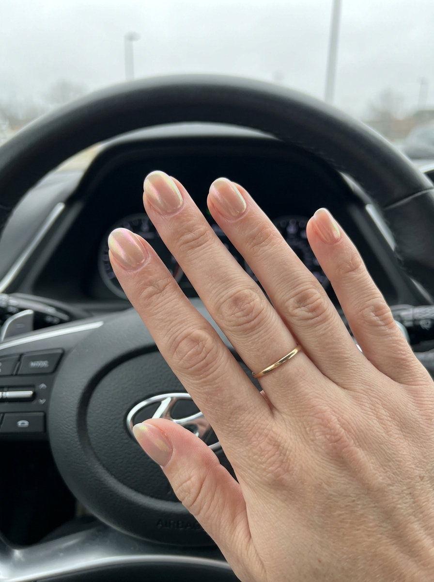 Peach Fuzz Chrome Haze Nails 2026 | Futuristic Summer Short round summer nails 2026: Futuristic peach fuzz chrome haze for party evenings.