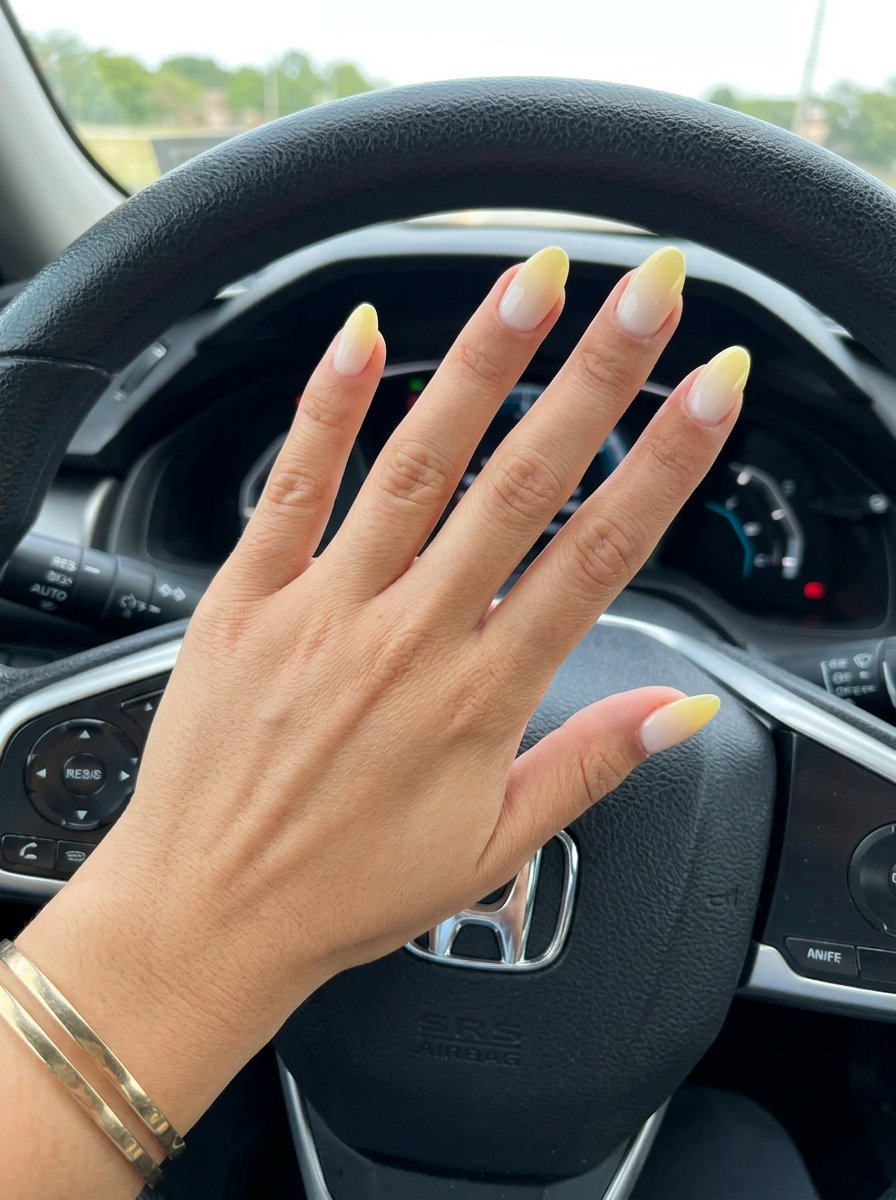 Butter Yellow Soft Fade Almond Nails 2026 Butter yellow soft fade almond nails for summer almond nails 2026, clean and optimistic.