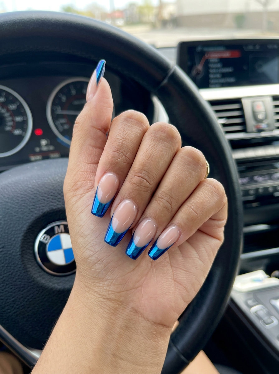 Electric blue chrome French nails on a nude base, ideal for festivals and parties. Summer colorful nails designs 2026.