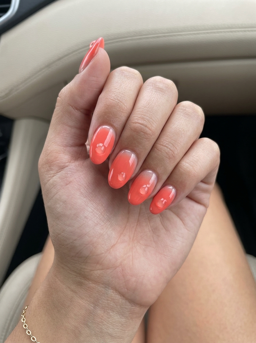 Coral Dew Drop French Nails 2026: Tropical Fun Vivid coral French tip nails with 3D dew drops for summer holiday nails 2026. Tropical and playful.