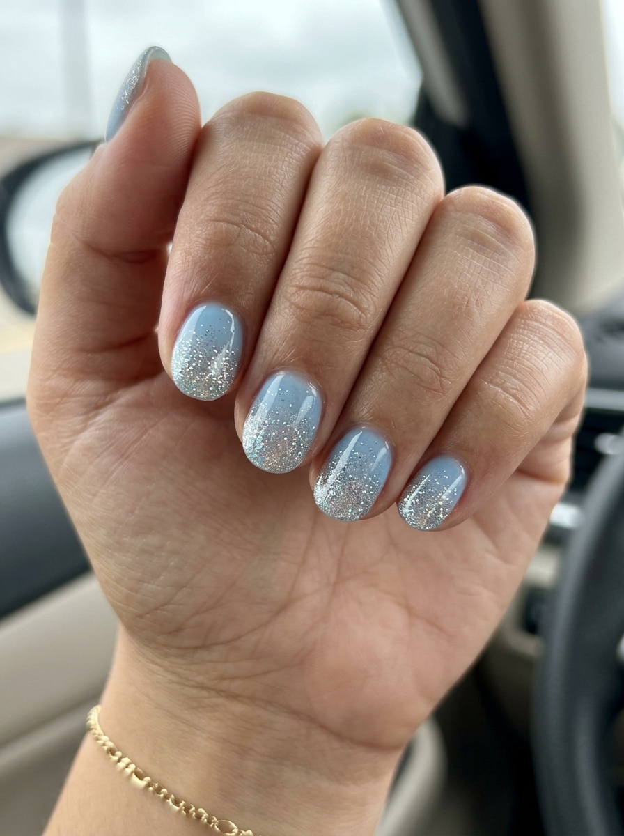 Starry Night Sky Glitter Gradient summer nail manicure ideas 2026 for festivals, parties. Whimsical and magical with sky blue and glitter.