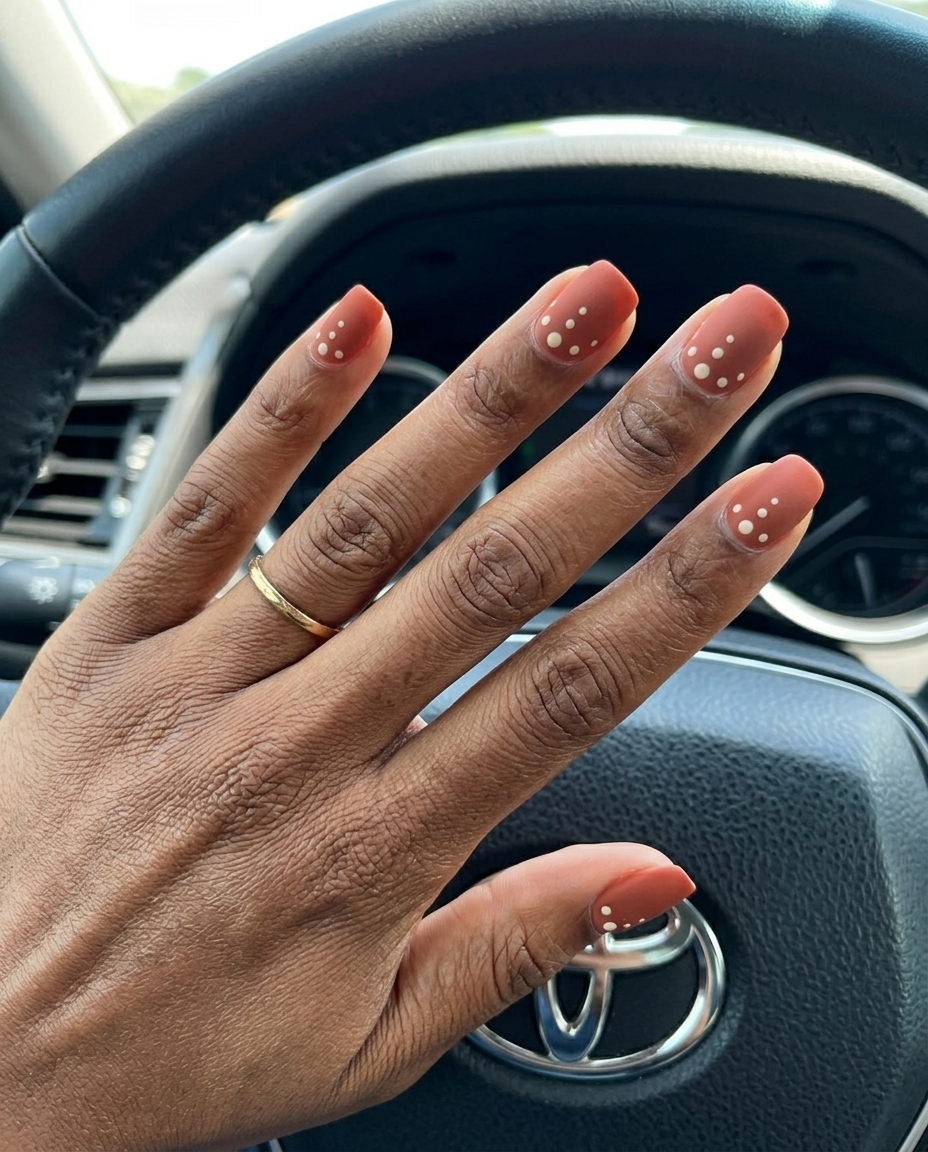 Terracotta Matte Dots Nails 2026: Chic & Grounded Rich Terracotta Matte Dots nails for dark skin 2026: minimalist, chic work-appropriate style with earthy tones.