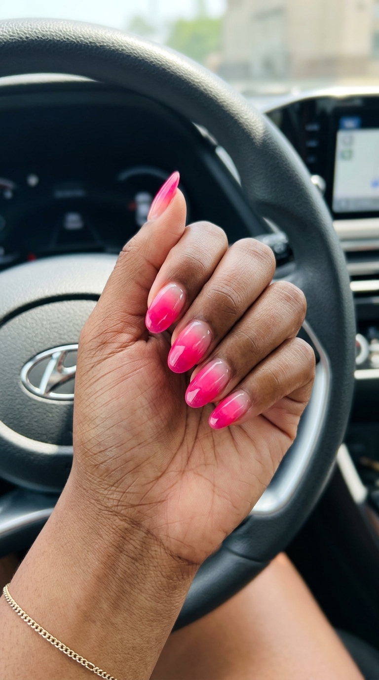 Hot Pink Jelly Ombre Nails 2026: Vacation Hot pink jelly ombre nails for vacations 2026. Playful, vibrant festival style.