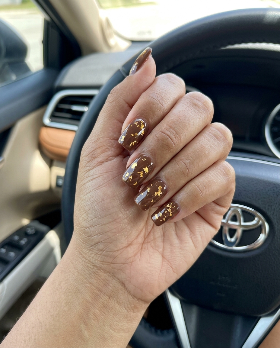 Glamorous Summer Nails Square Medium 2026 Summer nails square medium 2026: Chocolate brown with gold foil flakes for a glamorous party look.