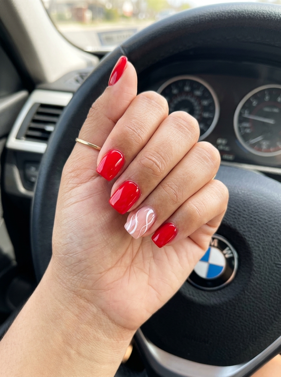 Summer Red Nails 2026: Playful Red Swirl Square Nails Summer red nails 2026: Playful true red square nails with white abstract swirls for casual days.