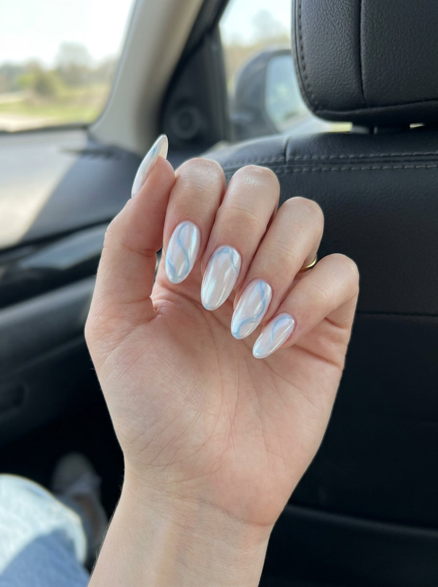 Pearlescent Ocean Mist Swirls 2026 Ocean Mist Pearlescent Swirls nails for summer vibes nails 2026, elegant for formal events.