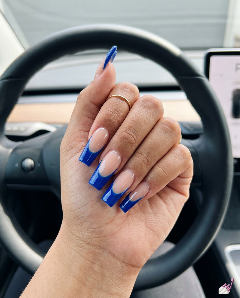 Cobalt blue French tip flare nails for trending summer nails 2026. Edgy, bold party outfit nails.