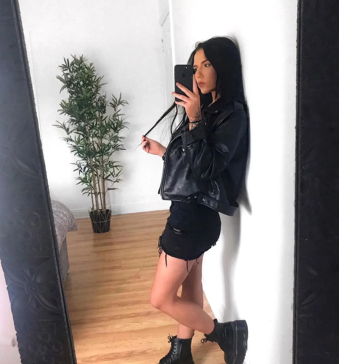 cute fall outfits docs 2026 All-Black Leather Layers Create Timeless Fall Edge