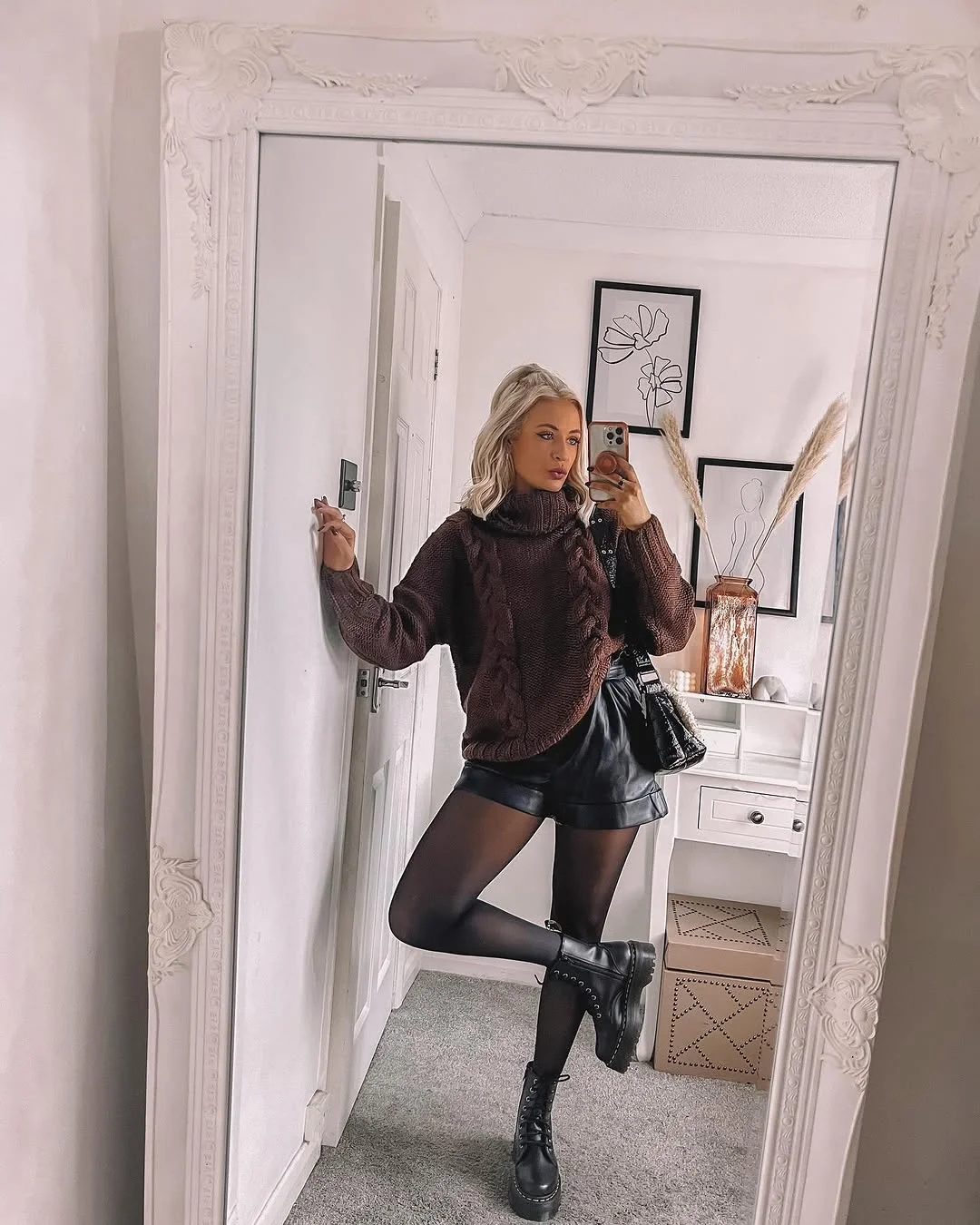 cute fall outfits docs 2026 A Cozy Cable-Knit Sweater Makes Chunky Docs Feel Even More Autumnal