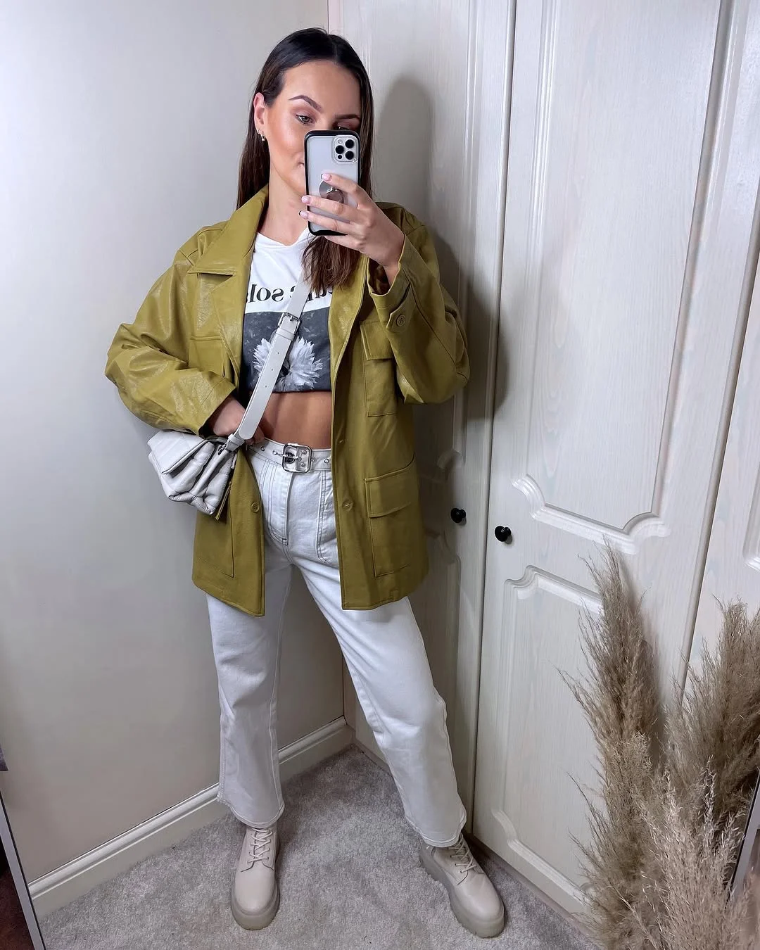 cute fall outfits docs 2026 White Leather Boots Brighten an Earth-Toned Fall Palette