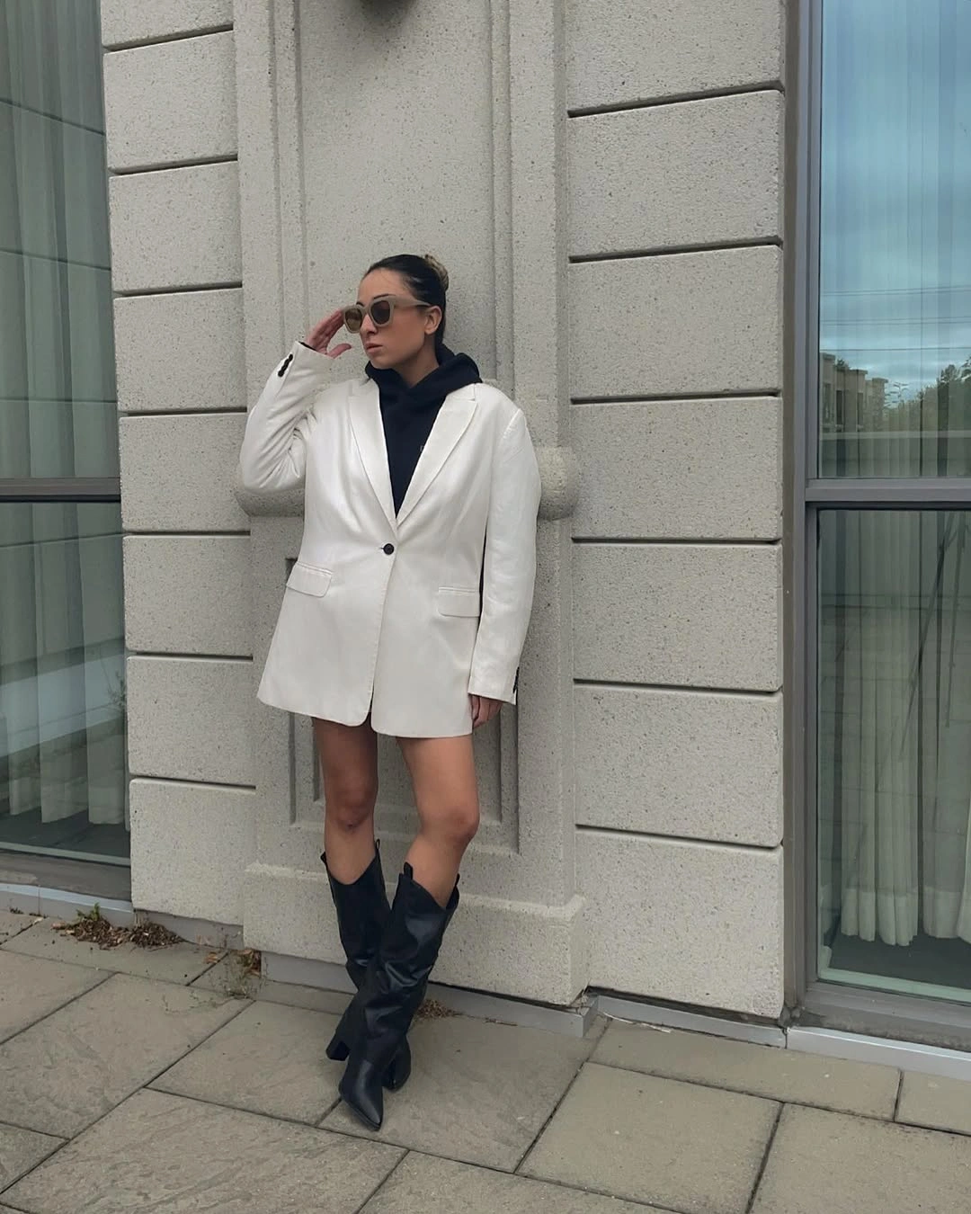 early fall outfits 2026 Sharp White Tailoring with Black Boots for Transitional Days