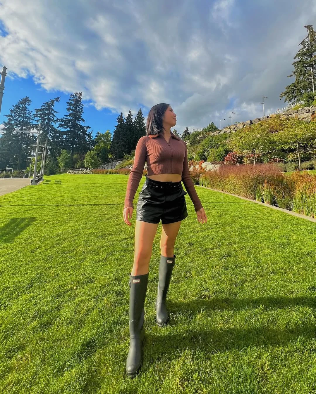 Early fall outfits ideas 2026 Leather Shorts And Tall Rain Boots For Warm Fall Weather