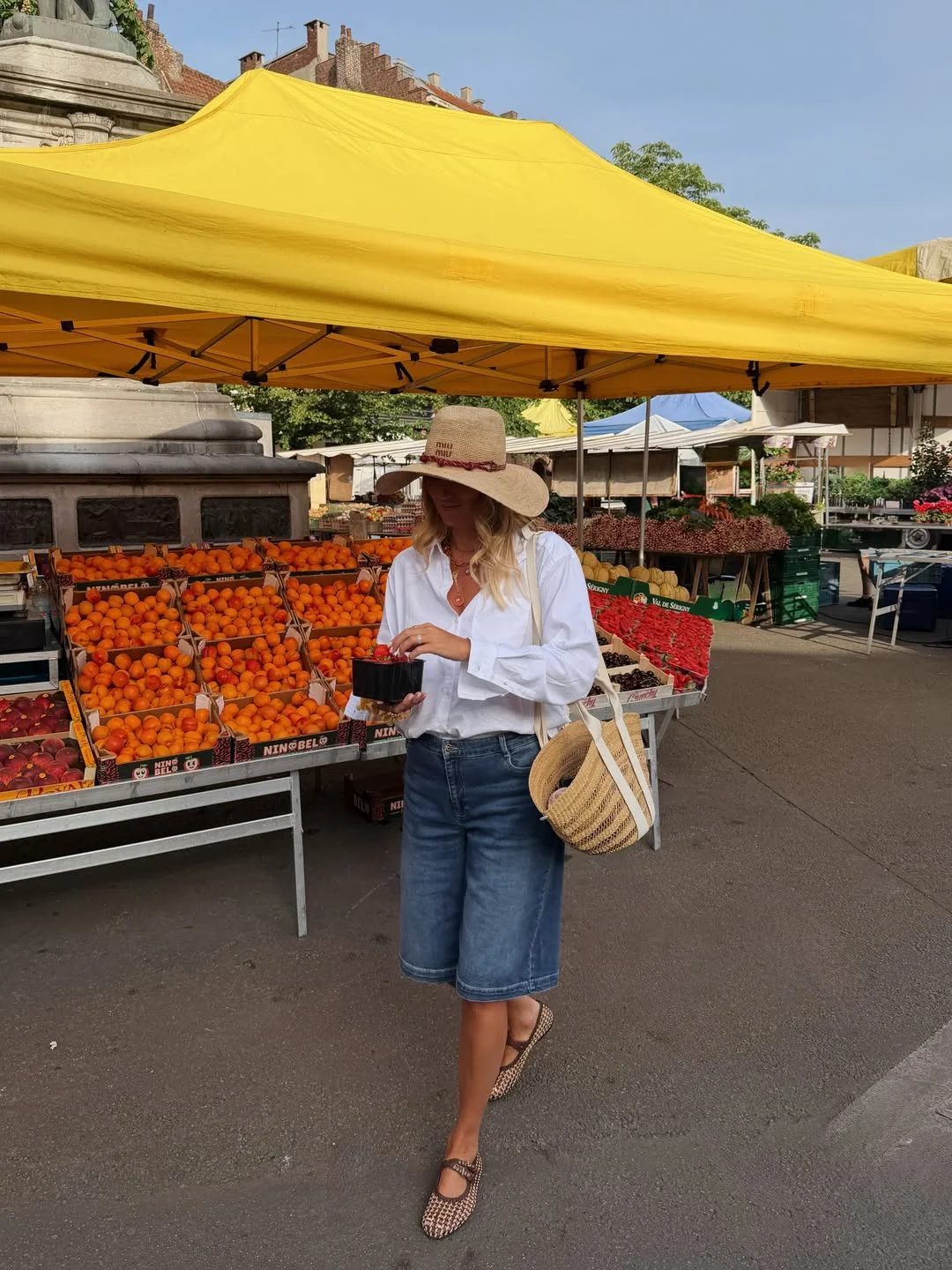 Early summer outfits 2026 Denim Bermuda Shorts Are Quietly Becoming A Summer Staple