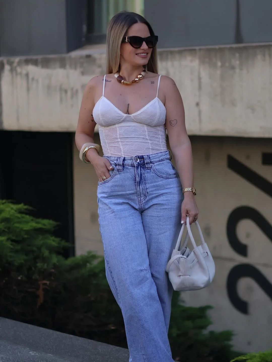 Early summer outfits 2026 Soft Corset Styling With Relaxed Denim