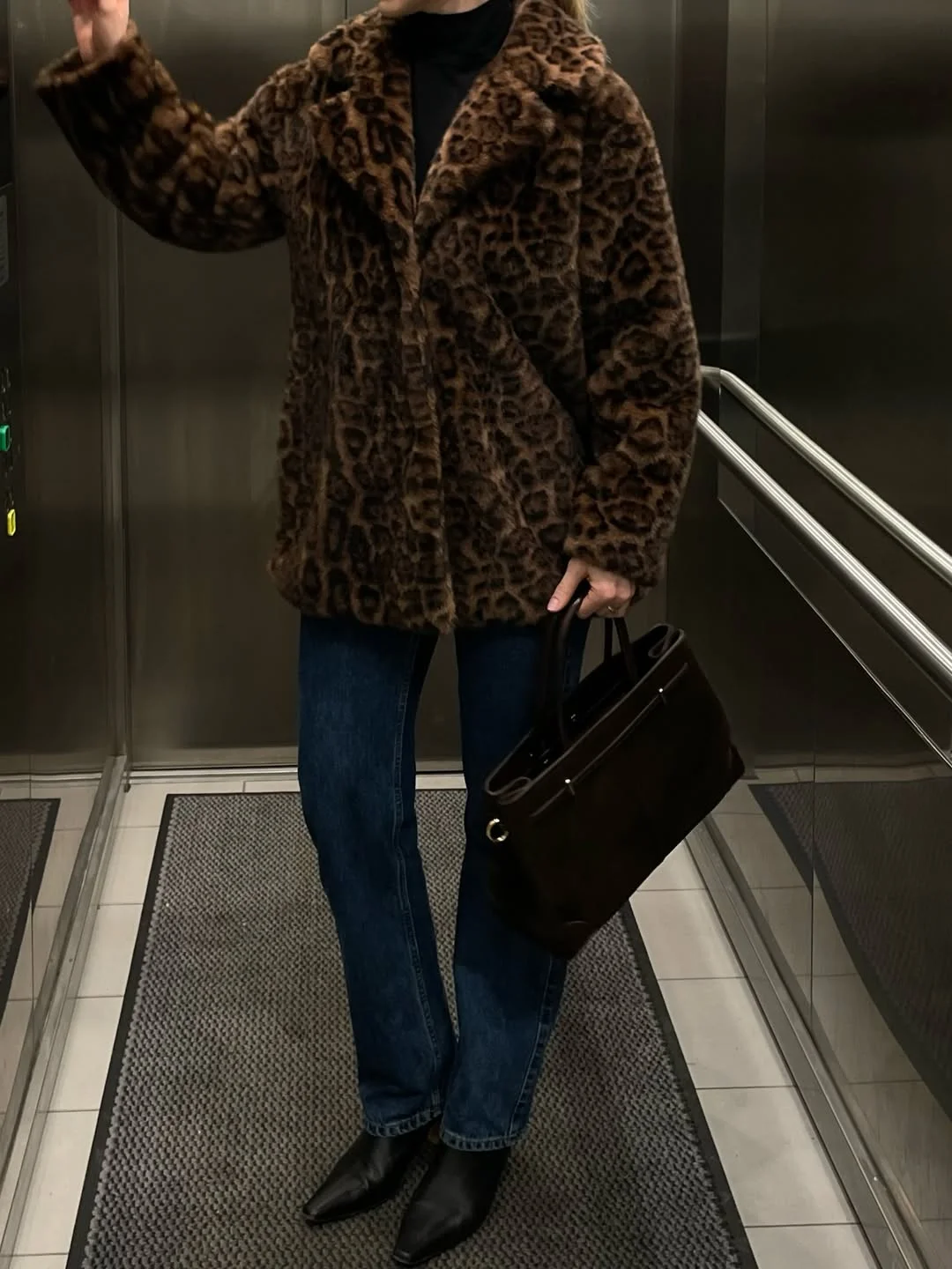 fall denim outfits for women 2026 Leopard Coats and Dark Denim for Moody Fall Evenings