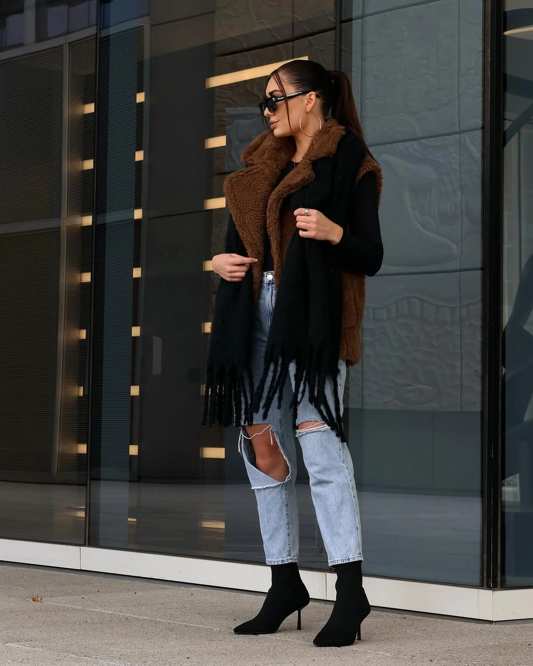 fall going out outfits 2026 Faux Fur Vest and Distressed Denim for Elevated Night Out Style