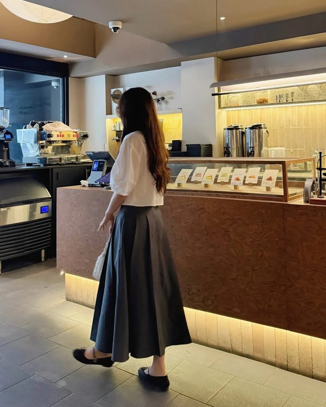 fall office outfits for women 2026 A Flowing Midi Skirt That Softens Office Style